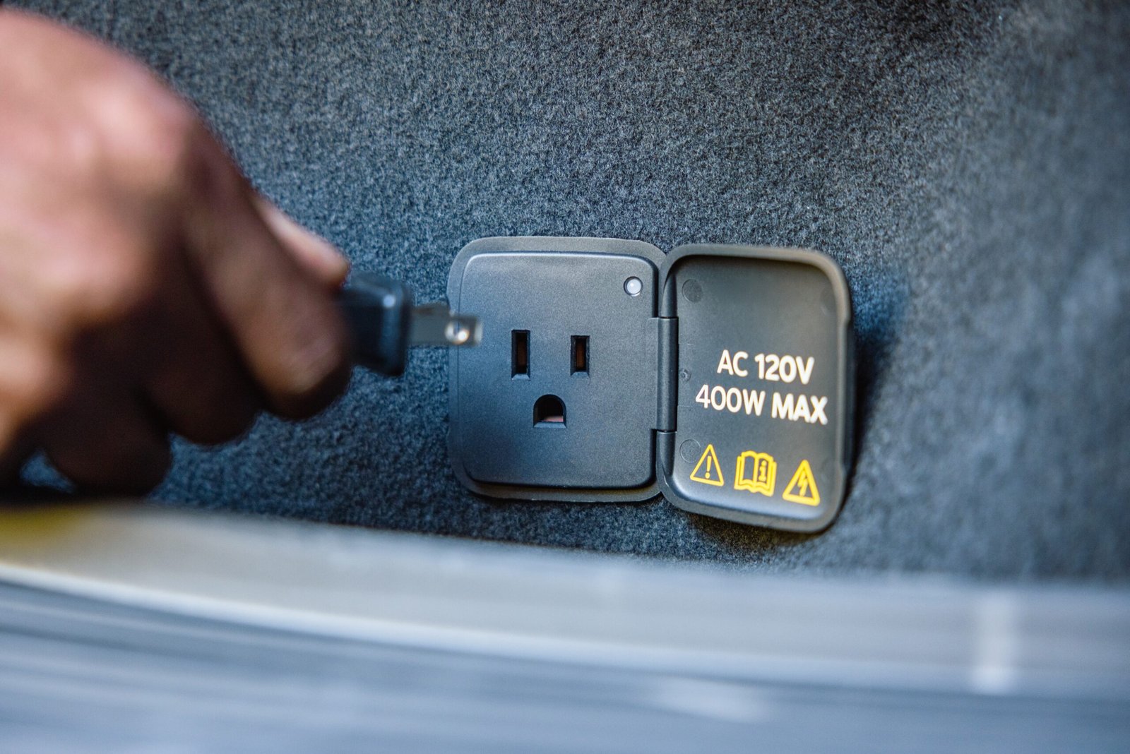 2027 Ford Mustang Mach-E Trail Pro Power Onboard outlet in use