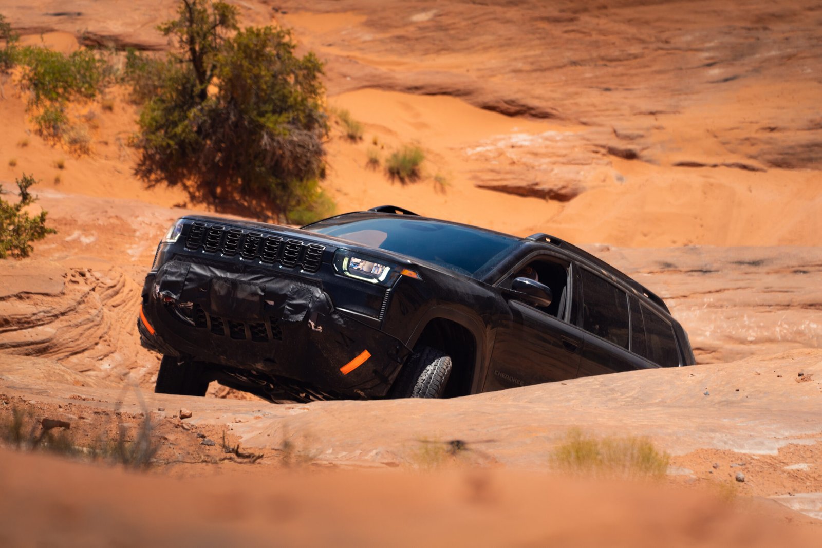 2027 Jeep Cherokee Trailhawk rock crawling during off-road testing