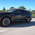 GM automated research vehicle with roof sensor rack testing eyes-off autonomous highway driving